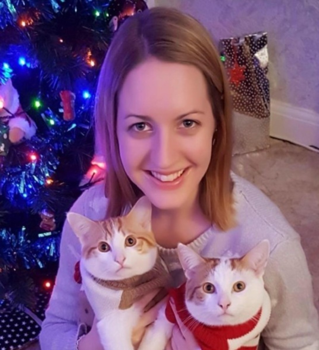 y Letby smiling while holding her two cats, Photo Credit: Ron Winter/X