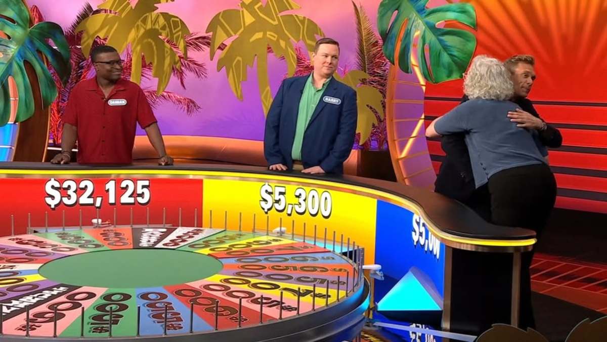 Wheel of Fortune contestants with host Ryan Seacrest hugging one contestant, Photo Credit: wheelwatchershub/Instgram