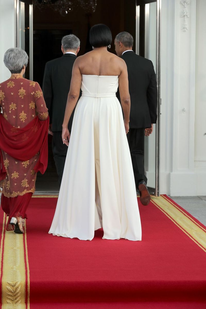 Former First Lady Michelle Obama's back of her white dress in a state dinner, 2016, Photo Credit: Marcel D./X