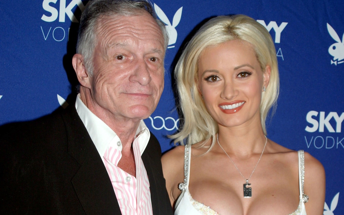 Hugh Hefner and Holly Madison in Los Angeles, California, during a celebration for the Playboy August 2006 issue sponsored by Skyy Vodka, Photo Credit: Sean Joseph/X